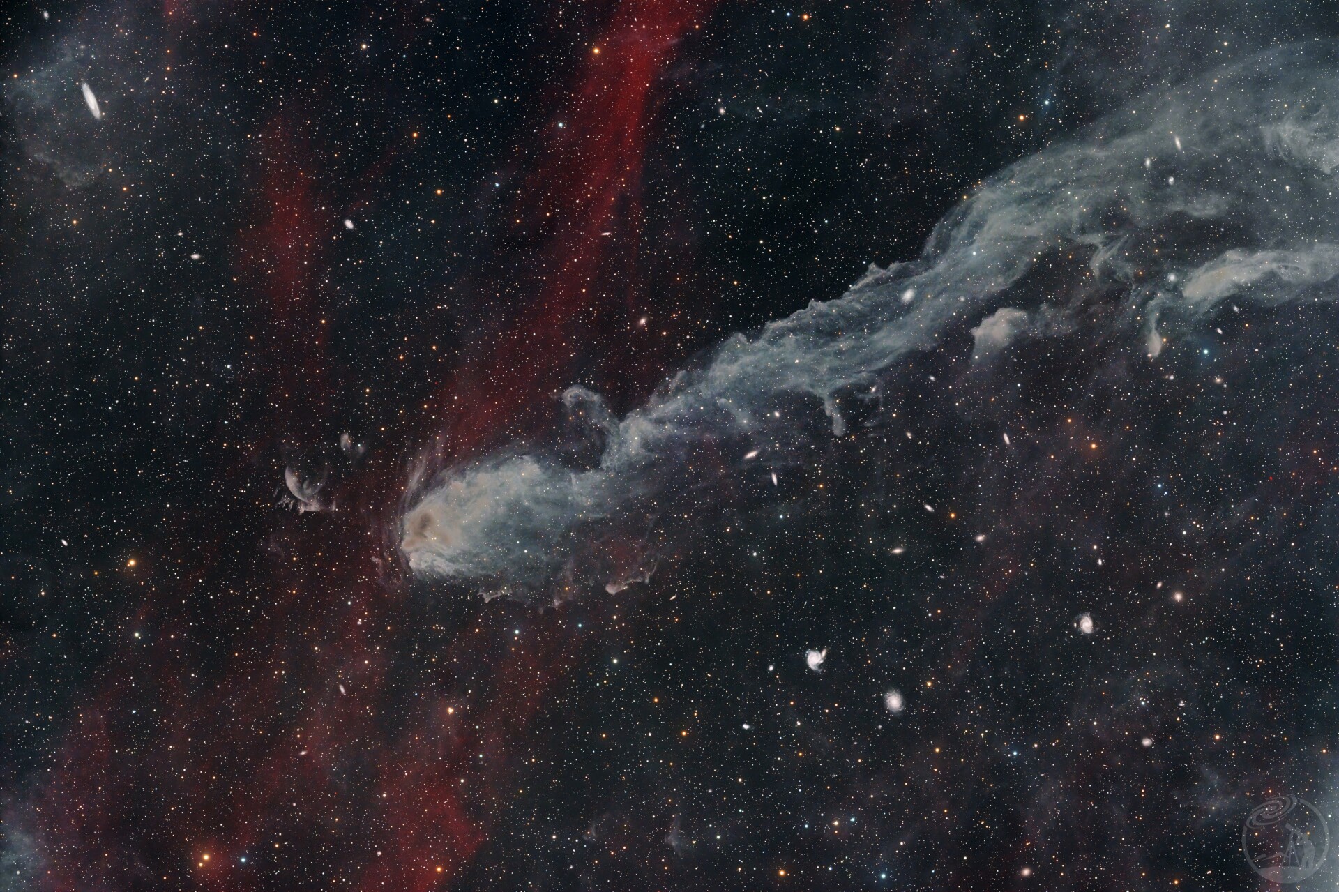 NGC7223隐藏在暗云和Ha下的众多星系